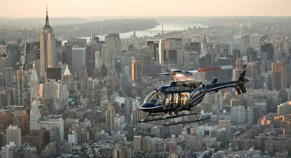 A Helicopter Flight Services Tour flying over Manhattan.