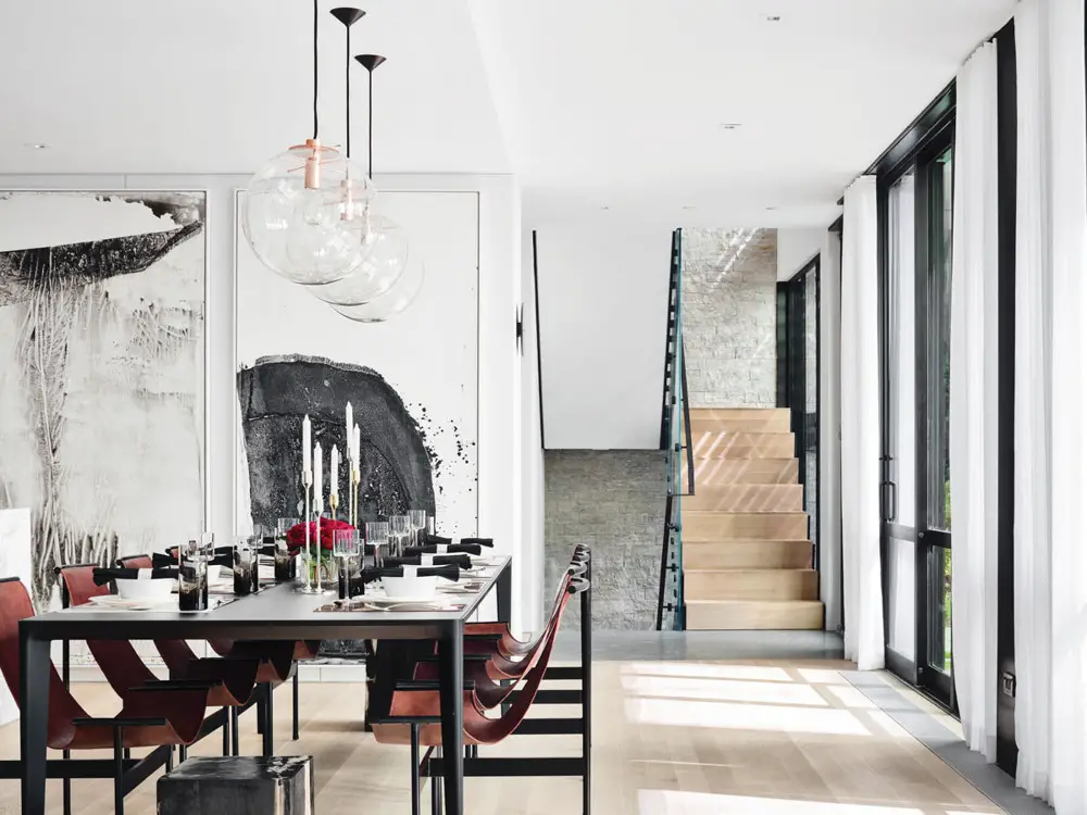 Workshop APD Designs a Chic Home in the West Village Complex Known ...  The dining area on the first floor is flooded with natural light, courtesy  of the