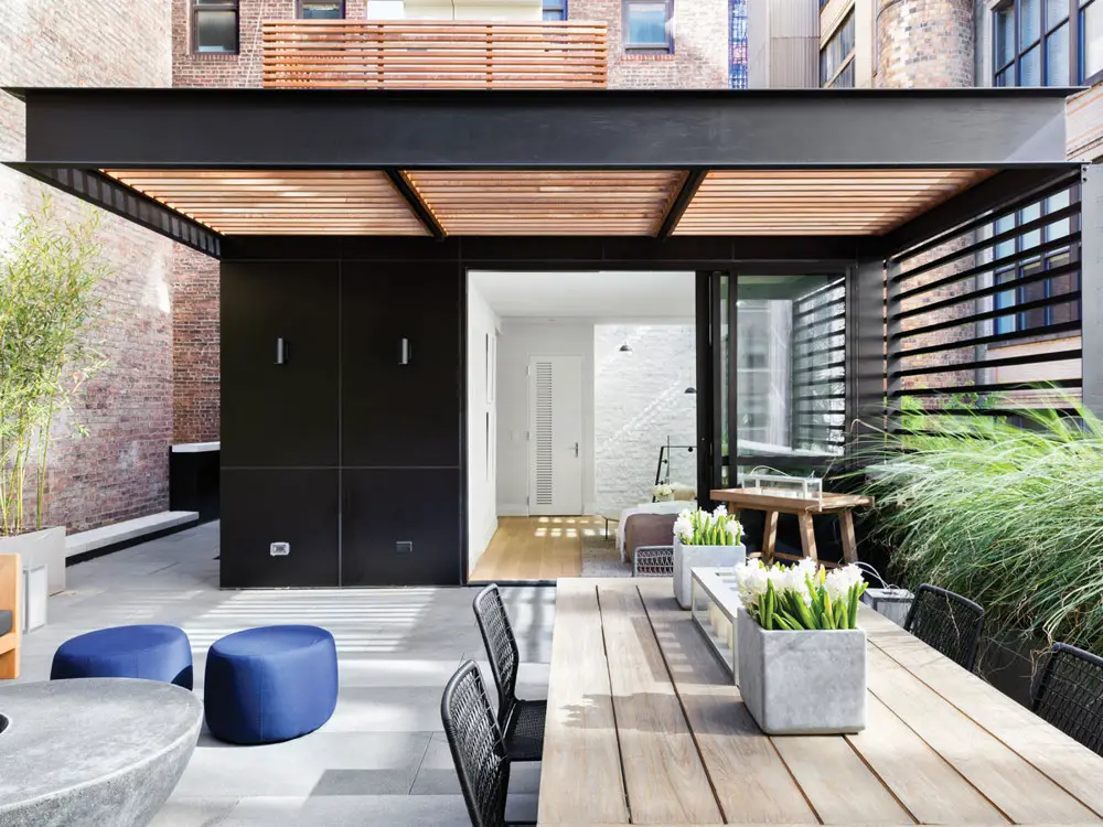 Workshop APD Designs a Chic Home in the West Village Complex Known ...  a welcoming terrace is shielded from above by a trellis which provides  privacy but still allows