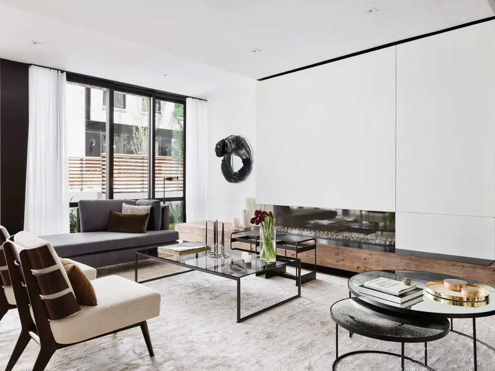 Workshop APD Designs a Chic Home in the West Village Complex Known ...  In the living area, a custom chaise by Prestige Furniture is a perfect  place to