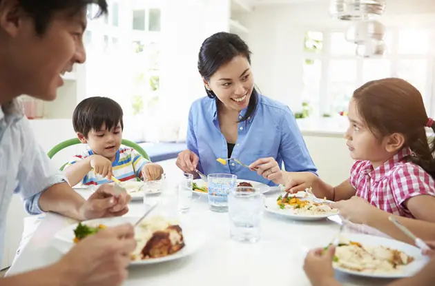 Asian family eating dinner