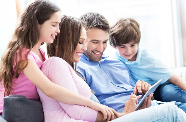 family using tablet