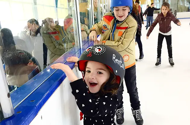 kids ice-skating indoors