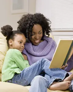 mother reading to daughter; mom and daughter reading