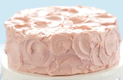 Divvies' vanilla layer cake with raspberry cream frosting; Divvies Bakery