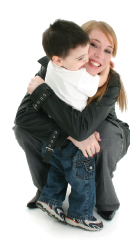 boy and babysitter hug