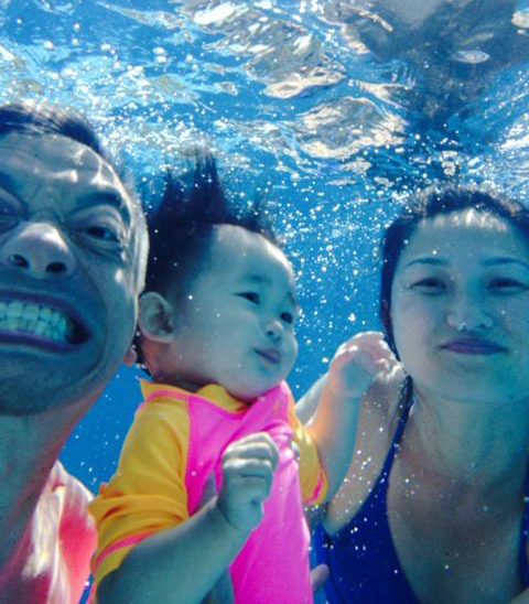 family under water