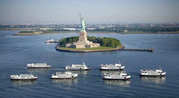 statue cruises new york harbor