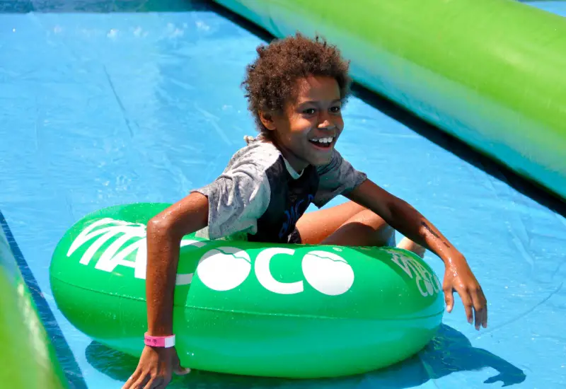 kid on water slide