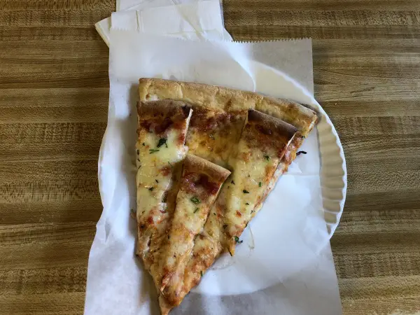 vinnie's pizza slice topped pizza