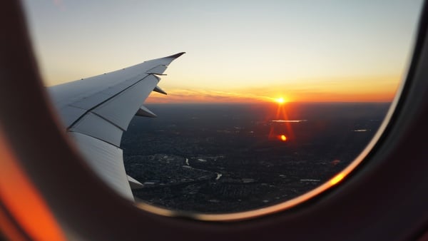 airplane wing sunset