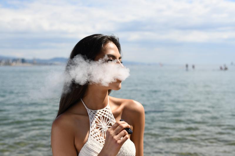 vaping on the beach