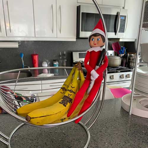 elf on the shelf drawing on bananas