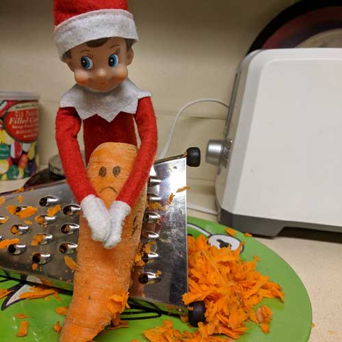 elf on the shelf grating carrot