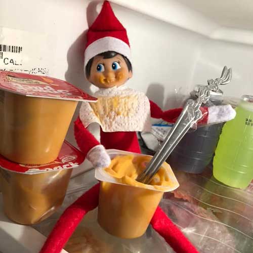 elf on the shelf eating pudding