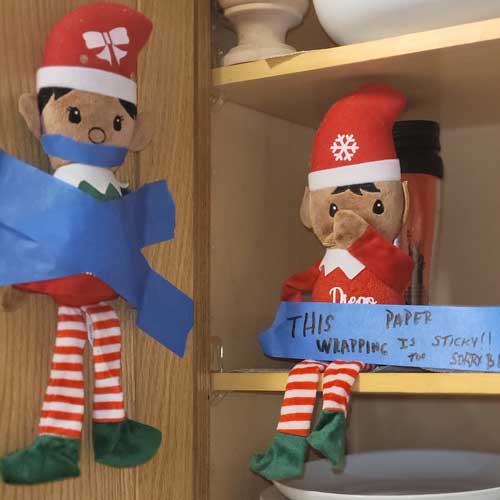 elf on the shelf trapping each other