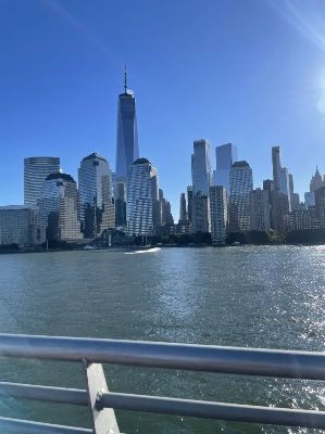 The view of Lower Manhattan from Seastreak's ferry departing NYC for a Hudson River fall foliage cruise