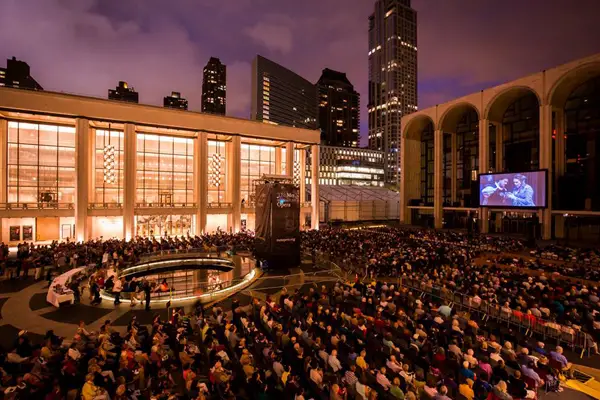 Visitors gathered for a video festival outside of the Metropolitan Opera.