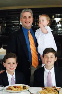 Paul Antico and his three children