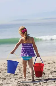 kids summer fun, building sandcastles on the beach