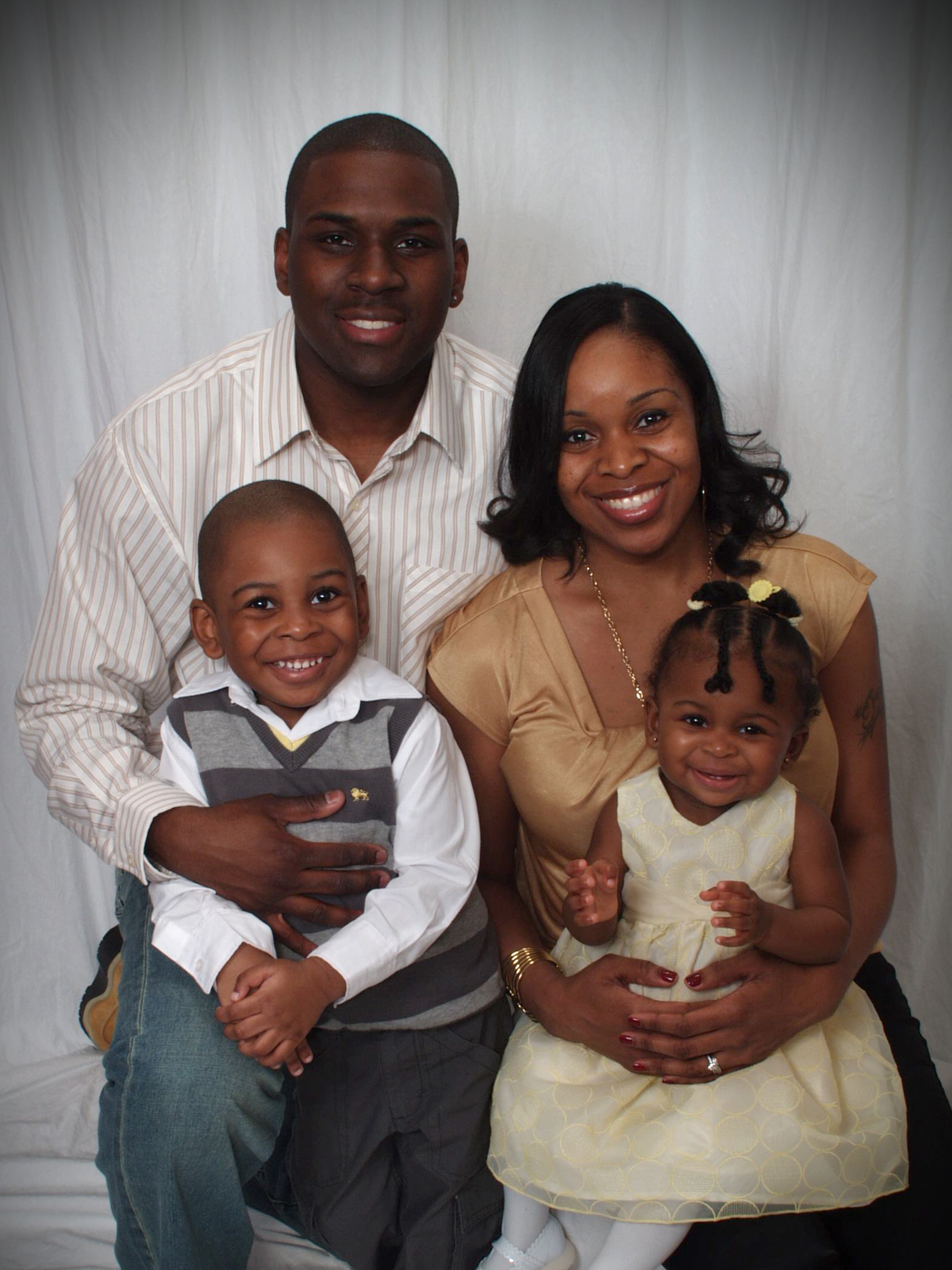 Anthony Merkerson with his family; both of his children are autistic.
