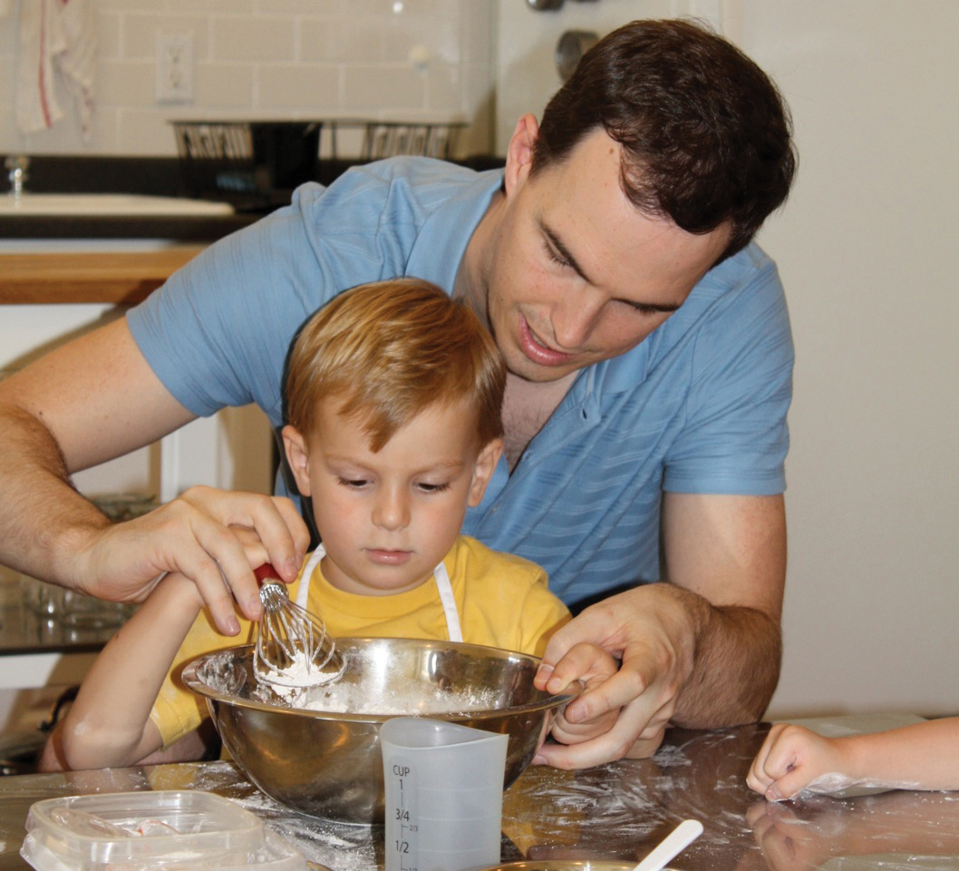 dad cooking with son