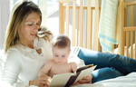 Mom reading to Baby