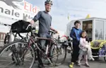 dad with kids biking