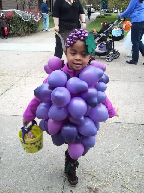 child in diy grape halloween costume