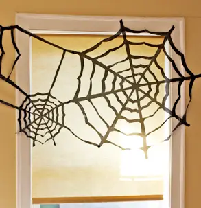 trash bag spider web halloween decoration