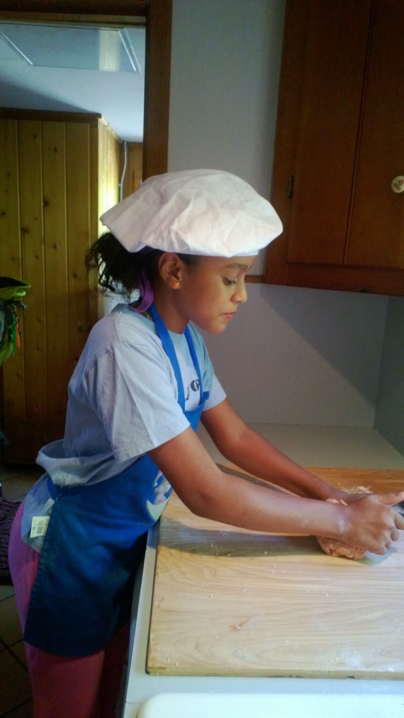 girl making pasta